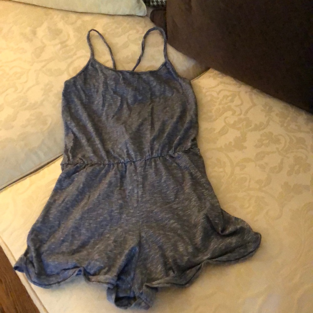 Cute summer romper with ruffle on legs